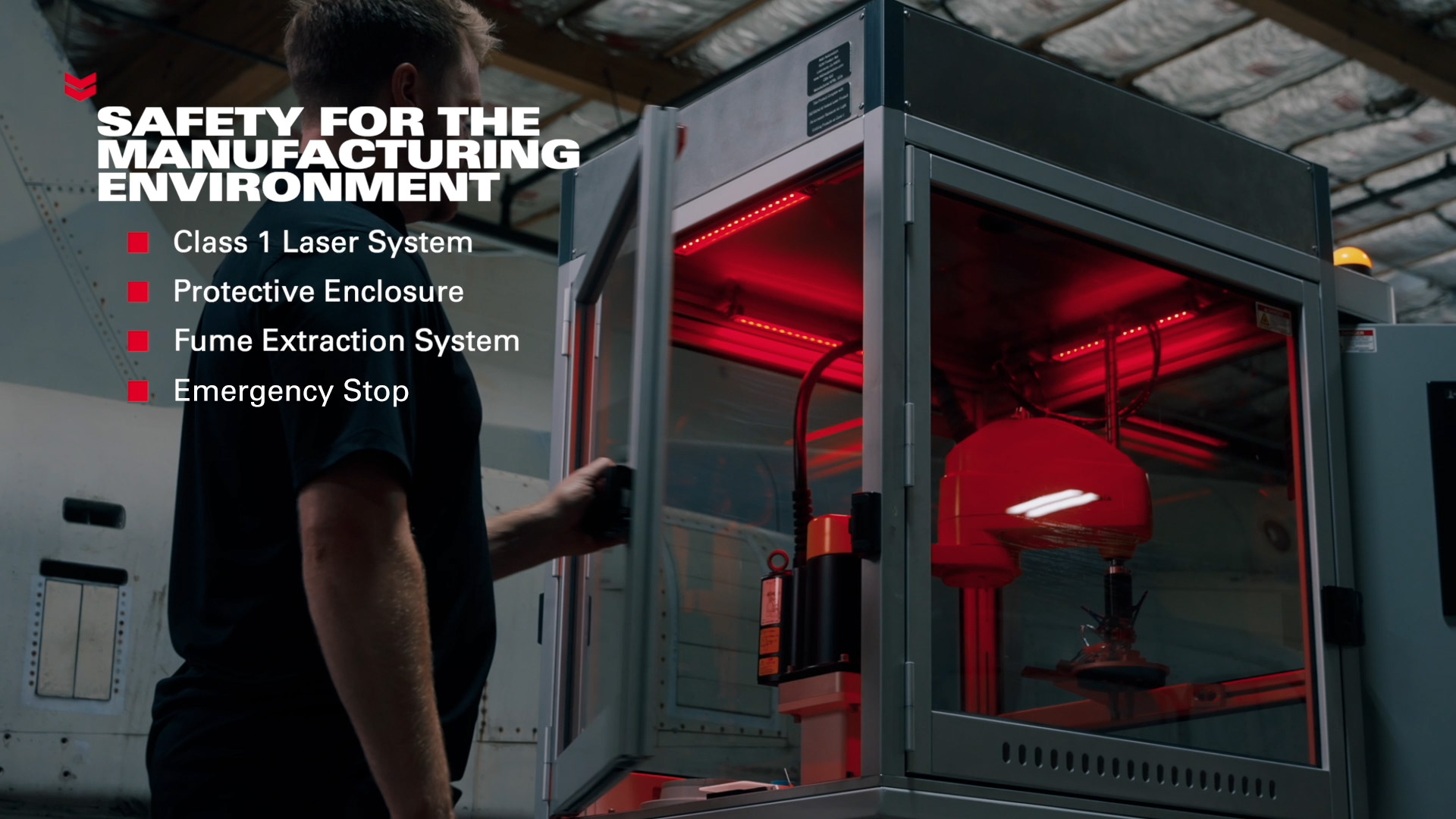 Operator monitoring Click Bond’s Automated Bonding Technology cell featuring a Class 1 laser system, protective enclosure, and integrated fume extraction for safe manufacturing environments.