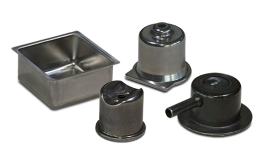 Four single-piece deep draw metal components formed by Click Bond
